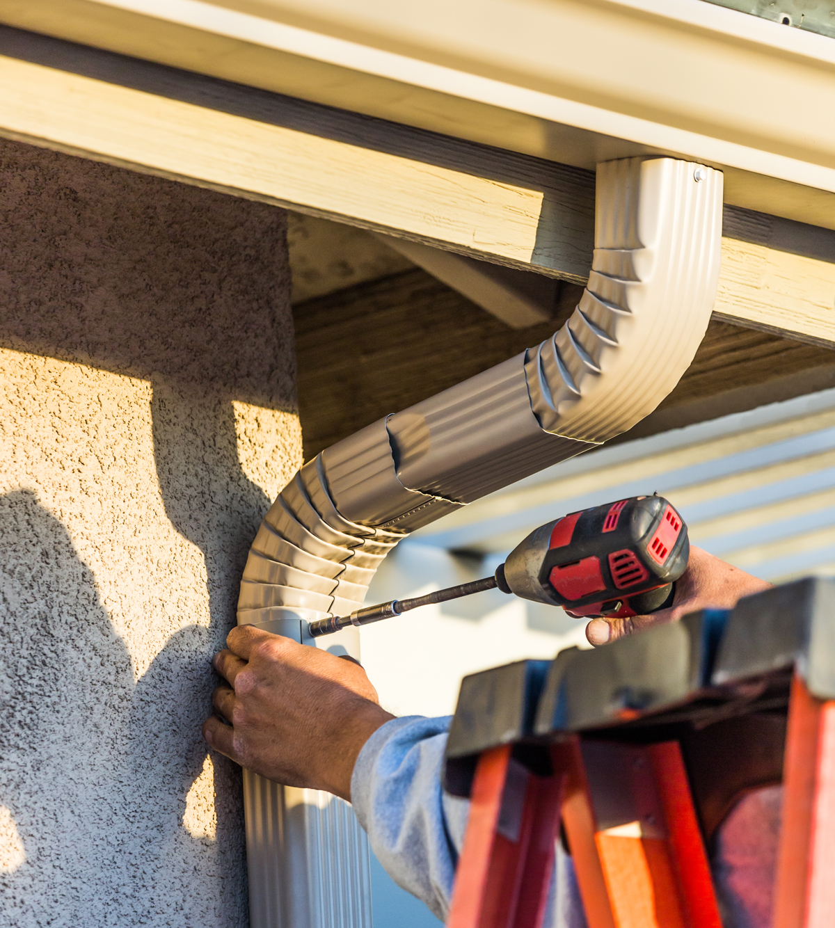 roofing contractors near me installing gutters